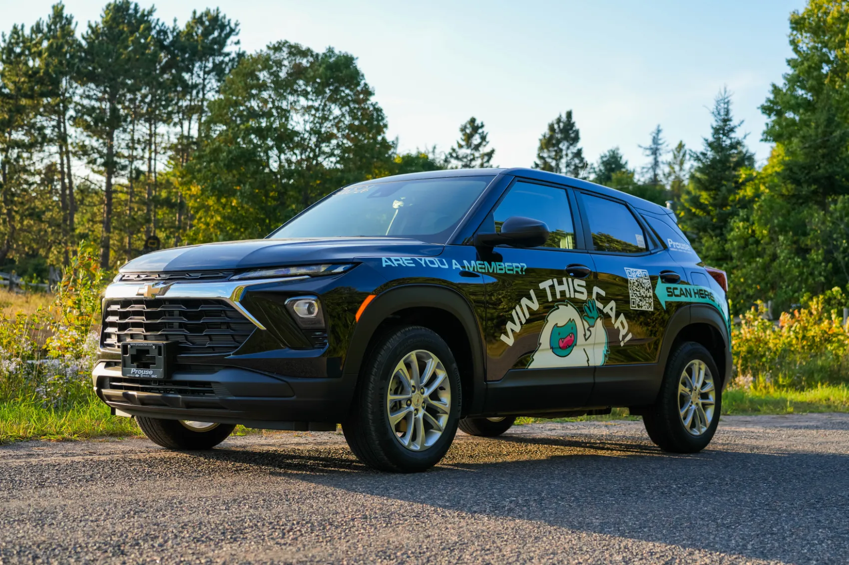The wrapped 2026 Chevrolet Trailblazer on a gravel road